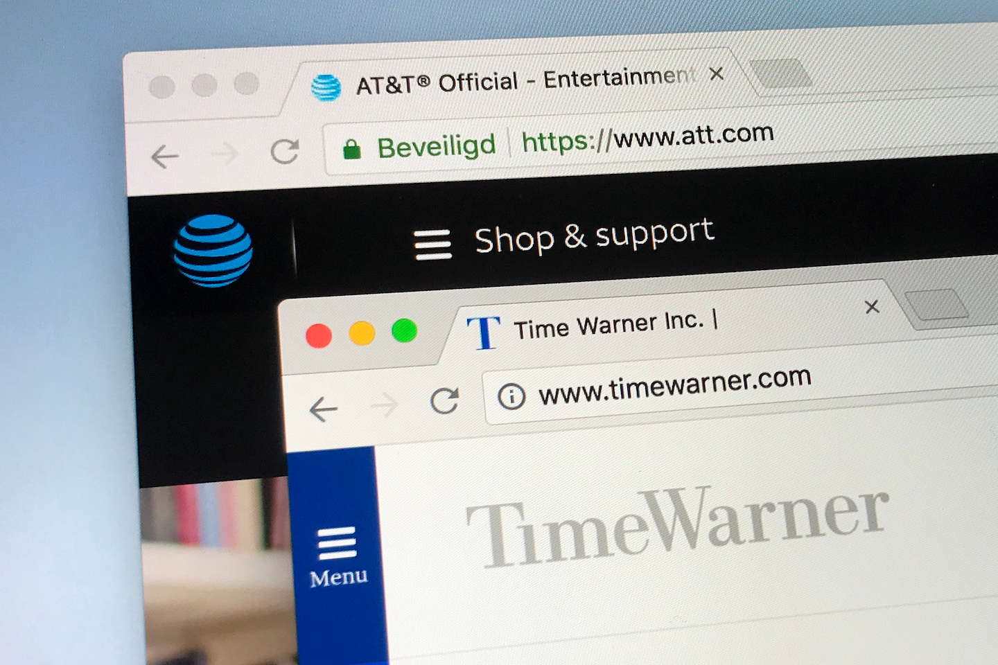 Websites of AT&T and Time Warner.